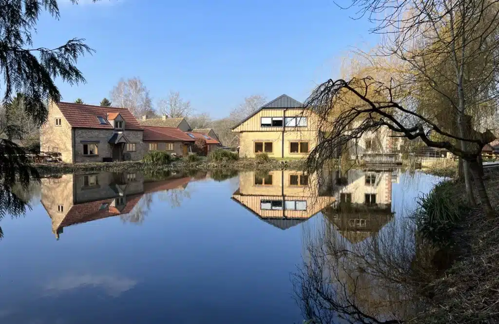 The millpond is a wildlife haven, providing a home to otters, kingfishers, swans and many other birds.
