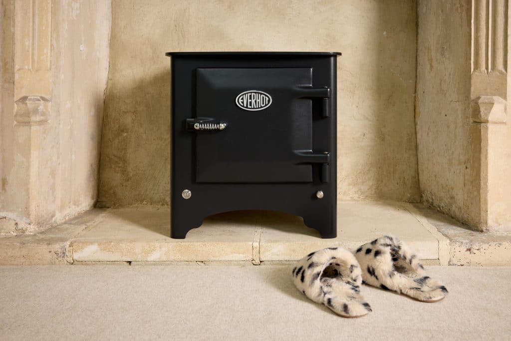 The Everhot Electric Heater sat on a beautiful stone fireplace