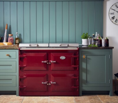 Burgundy Everhot cooker in green kitchen
