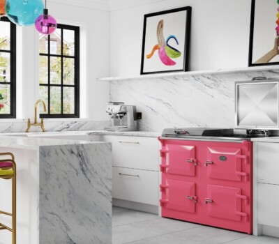 Fandango Pink Everhot cooker in white marble kitchen