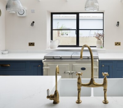 CReam Everhot in blue kitchen in front of window